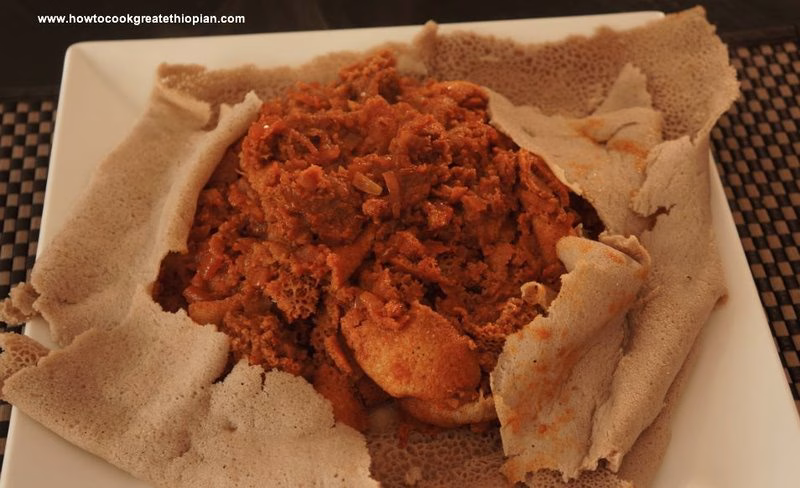 Lablab Firfir (Broad Beans With Injera)